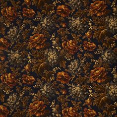 an orange and brown floral pattern on black fabric