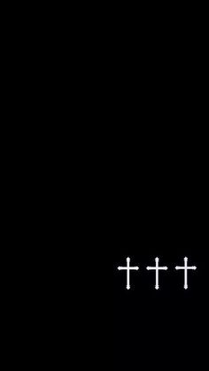 the cross is white in color against a black background