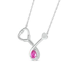 This stethoscope necklace is perfect for someone in the medical field. Sterling Silver Pear-shaped pink lab-created sapphire Round-cut white lab-created sapphires 17-inch rope chain with spring-ring clasp Stethoscope Necklaces, White Lab, Rope Chain, Pear Shaped, Spring Rings, Pear, Sapphire, Chain, Sterling Silver