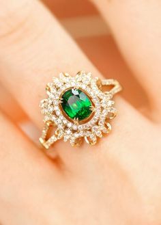 *Condition: Brand new *Center Stone: Natural Tsavorite, Oval cut, approx 1.06ct, 5.5 x 7.7mm *Side stones: Natural white diamond round-cut, approx 0.595ct total (VS1 clarity and F color) *Ring Weight: 3.95g (depend the ring size) *Metal Purity: Optional Each piece is made-to-order with care and special attention to detail. all items are made with conflict-free diamonds and gems. The item will be gift wrapped and shipped. ------------------------------------------------------------------- Availab Oval Emerald Moissanite Ring, Oval Moissanite Emerald Green Ring, Oval Tsavorite Diamond Ring As Gift, Oval Tsavorite Rings With Halo Setting, Oval Green Moissanite Emerald Ring, Oval Tsavorite Wedding Ring, Oval Tsavorite Jewelry For Anniversary, Oval Tsavorite Ring With Gemstone Accents, Oval Tsavorite Ring With Center Stone