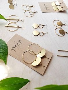 Our new all brass collection was created as a vegan friendly alternative to our classic leather earrings. They are minimalist, modern and of course, lightweight, like all our earrings. This listing is for one pair of earrings with raw brass accents.Shop additional styles here: https://etsy.me/2P8QY6c••••••••••••••••••••••••••••••••••••••••••••••••••••••••••••••• ORDERING • These earrings measure approx 1 1/8" wide, 1 1/2" drop with hook. Each pair of earrings come on an earring card with clear s Artistic Earrings, Boho Drop Earrings, Half Moon Earrings, Earring Card, Dangle Hoop Earrings, Gold Statement Earrings, Statement Drop Earrings, Earrings Accessories, Earring Cards