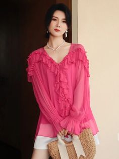 This is perfect for those who are looking for a clothing for a good price. It is fashionable, stylish, and it will look great on anyone who wears it. Do you wanahavit? SIZE S:bust:106cm,sleeve length:62cm,length:68cm M:bust:110cm,sleeve length:63cm,length:69cm Note: 1 inch = 2.54 cm, 1 cm = 0.39 inch Measurement by hands allow 2-3cm errors which is normal Pink V-neck Chiffon Top, Pink V-neck Blouse With Ruffles, Pink Chiffon Top For Party, Pink Chiffon Party Top, Chic Long Sleeve Pink Blouse, Chic Pink Long Sleeve Blouse, Pink Long Sleeve Chiffon Top, Chic Pink Chiffon Blouse, Pink Ruffled V-neck Blouse