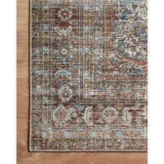 an area rug with various colors and patterns