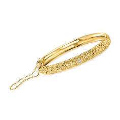 Ross-Simons - C. 1950 Vintage .10ct Diamond Swirl Bangle Bracelet in 14kt Yellow Gold. 7". C. 1950. Impressed with a sophisticated swirl design, this opulent Retro-era bangle bracelet from our Estate collection shines in rich 14kt yellow gold with a sparkling .10 carat round brilliant-cut diamond. Textured and polished finishes. Hinged. Safety chain. Push-button clasp, diamond swirl bangle bracelet. Exclusive, one-of-a-kind Estate Jewelry. Diamond birthstones are the perfect gift for April birth Fine Jewelry 14k Stamped Bangle, Formal Engraved Yellow Gold Diamond Bracelet, Heirloom Yellow Gold Round Diamond Bracelet, Filigree Round Bracelet For Anniversary, Anniversary Filigree Round Bracelet, Classic Engraved Yellow Gold Diamond Bracelet, Yellow Gold Filigree Bracelets, Engraved Diamond Wedding Bracelets, Fine Jewelry Engraved Bracelets For Formal Occasions