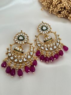 kundan  work classic chandbali statement earrings, available in 4 colors.  Lightweight  Dimensions- Earrings length- 3 inches  Style tip- Pair it with any beautiful traditional outfits  and flaunt with Unique style of collection from us. Perfect match for Festival and Traditional wear.  Take Care Tips-  Kee away from perfume, Hair spray and. Moisture.  Store in dry place , Ziplock bag or Airtight box.    Clean with dry cloth.  Jewellery is the last thing you should wear and first thing you shoul Diwali Chandbali Earrings With Mirror Work, Festival Chandbali Earrings With Mirror Work, Festival Chandbali Chandelier Earrings With Mirror Work, Chandbali Earrings With Mirror Work For Festivals, Chandbali Chandelier Earrings With Mirror Work For Festivals, Festive Chandbali Chandelier Earrings With Mirror Work, Festival Mirror Work Chandbali Earrings, Festival Chandbalis With Mirror Work, Kundan Danglers With Mirror Work