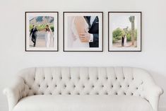 a white couch sitting in front of three pictures on the wall next to each other