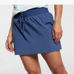 Brand New Blue Elastic Waistband Skort, Blue Short Length Skort With Elastic Waistband, Casual Short Skort With Pockets, Blue Vacation Shorts With Side Pockets, Beach Skort With Pockets In Short Length, Beach Skort With Pockets, Casual Skort With Pockets And Short Inseam, Casual Skort With Side Pockets, Casual Short Skort With Side Pockets