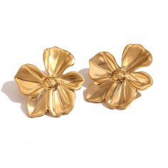 Add a pop of fun to your spring wardrobe with these Flower Statement Earrings! These large flower earrings are the perfect accessory to make a statement with your outfit. Embrace the spirit of the season with these playful and quirky earrings. DETAILS & SIZE Sold as a pair Finish: 18K gold plate Material: Stainless Steel Measurements: Large: 29mmx33mm; Medium: 19mmx16mmmm Weight: Large: 10.8 grams; Medium: 3.5 grams Comes with friction earring backs Waterproof, tarnish-resistant, and nickel free Shop Earrings to curate your ear stack! Chic Spring Flower Earrings For Pierced Ears, Spring Flower Earrings For Pierced Ears, Handmade Flower Earrings For Spring, Spring Party 3d Flower Earrings, Chic Flower Earrings As A Gift, Chic Flower Charm Earrings For Gift, Chic Flower Charm Earrings As Gift, Handmade Flower Drop Earrings For Spring, Gold Earrings With 3d Flowers For Spring