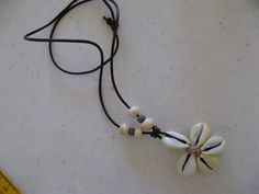 Handmade Adjustable Cowrie Shell Necklaces, Cowrie Shell Flower, Handmade Cowrie Shell Beachy Necklace, Cowrie Shell Flower Necklace, Pink Shell Necklace, Cowrie Shell-shaped Necklace For Festivals, Gold Seashell Necklace, Necklace Guide