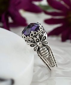 Elevate your style with this stunning handcrafted Amethyst Gemstone Double Queen Bee Detailed Women's Sterling Silver Cocktail Ring. Designed by expert filigree artisans, this ring features intricate details and a beautiful double queen bee design that is sure to make a statement. The ring is adorned with a 10mm double side faceted round cut Amethyst gemstone, which is the February birthstone, making it the perfect gift option for any February-born women. Perfect for special occasions such as Mo Luxury Sterling Silver Gemstones With Accents, Filigree Rings, Playful Jewelry, Purple Band, Bee Design, Filigree Design, Sterling Silver Filigree, Purple Stones, Gifts For Your Girlfriend