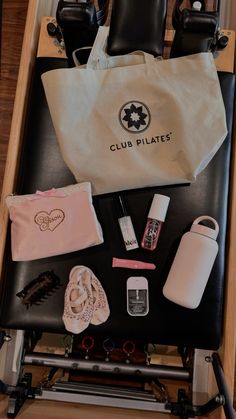 an assortment of personal care items sitting on top of a chair