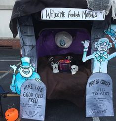 an outdoor display with skeletons and tombstones