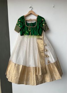 Fashion continues to change and make your own style statement. Please do send us messages regarding your dream wedding outfit. Green silk blouse with floral motif and Kali work go with an organza Lehenga which have a gold Jerry boarder. A matching dupatta and a waist belt comes with this.  It's inside is completely finished with soft cotton fabric. Size and color of blouse can be customise according to your needs. We need 10 days production time and 7 days shipping time. Organza Lehenga, Indian Blouse, Etsy Wedding Dress, Indian Wedding Dress, Green Silk, Silk Blouse, Wedding Outfit, Lehenga, Indian Wedding