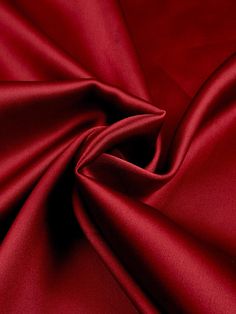 Indulge in the luxurious feel of this 58"/60" wide (147/152 cm) Silk Skin Duchess fabric, also known as Peau de Soie. Its dull satin finish and lightweight drape make it a perfect choice for creating elegant bridesmaid dresses, formal gowns, or any special occasion attire. With a subtle sheen and smooth texture, this high-quality silk fabric offers a sophisticated look and feel. Whether you're a professional dressmaker or an avid sewing enthusiast, this versatile material will elevate your projects with its timeless beauty and exceptional craftsmanship. Elevate your sewing experience and create stunning garments that will turn heads with this premium Silk Skin Duchess fabric. Luxurious Fabric: Crafted from exquisite peau de soie silk, this fabric offers a dull satin finish and a smooth, su Duchess Fabric, Bridesmaid Dresses Formal, Red Jewel, Elegant Bridesmaid Dresses, Elegant Drapes, Matte Satin, Red Satin, Dresses Formal, Red Fabric