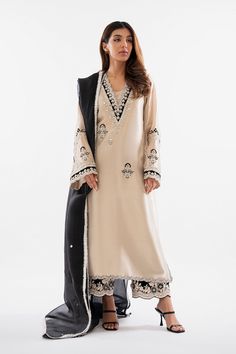 Shyra – Sania Maskatiya International Pakistani Straight Suits, Tissue Pakistani Suits, Pakistani V Neck Designs, V Neck Pakistani Suit, Elegant Gold Long-sleeve Palazzo Set, Tissue Suits Design Pakistani, Elegant Velvet Kurta With Mirror Work, Elegant Gold Velvet Traditional Wear, Elegant Gold Organza Lawn Suit