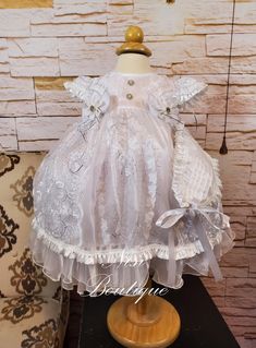 "★Our Lady of Guadalupe Baptism Dress★ ★Occasion: Baptism, Child Blessing or any Special Occasion ★Comes With: Dress  ★Measurements 9/12 months, (Long 21\") (Waist 20\") (Shoulder to Shoulder 8\") 12/18 months, (Long 23\") (Waist 20\") (Shoulder to Shoulder 8\") 2 years, (Long 25\") (Waist 21\") (Shoulder to Shoulder 8\") 3 years, (Long 27\") (Waist 22\") (Shoulder to Shoulder 8\") 4 years, (Long 31\") (Waist 23\") (Shoulder to Shoulder 9\") 6 years, (Long 33\") (Waist 26\") (Shoulder to Shoulder 9.5\") -Waist measurement is around ★Features: The back is open, for comfort when you load the baby (The waist is adjustable, has two ribbons to make a bow, as in the photo) Please check the measurements, and any questions send me a message,  your satisfaction is very important for me Comes with a Cream Baptism Dress With Ruffles For Pageant, Pageant Baptism Dress In Cream With Ruffles, Girls White Dress, Christening Gown, Baptism Dress, Our Lady Of Guadalupe, Dress Occasion, Lady Of Guadalupe