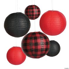 four red and black paper lanterns hanging from strings