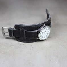 Leather watch strap Military of High quality. Compatible with watch case 18mm, 20mm, 22mm, 24mm. Paul Newman-like Black bund strap. The custom handmade leather cuff watch band is soft, comfortable, durable, sure to serve you for years and will definitely make your watch stand out from all the others. Immediately takes the shape of your wrist and looks stylish on your hand, emphasizing the beauty of your watch. -The strap has a black smoky color with a noble sheen with a vintage effect, will appeal to lovers of vintage style. -Watch bund band, designed and made by me from start to finish. I wanted the strap to be durable and comfortable so I chose distressed leather Crazy Cow. Leather from the legendary English manufacturer Charles F Stead. This is beautiful Premium Full grain Pull-Up, leat Black Watch Band For Everyday Use, Black Watch Bands With Wrist Strap For Everyday Use, Watch Accessories With Bracelet Strap For Everyday Use, Everyday Watch With Bracelet Strap And Round Dial, Everyday Watch Band With Stainless Steel Clasp, Black Leather Strap For Watch Accessories For Everyday Use, Black Leather Strap For Watch Accessories, Black Leather Strap For Watch, Black Leather Strap For Everyday Watch Accessories