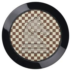 a black and white checkered plate with a horse on it