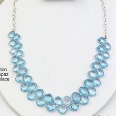 There are statement necklaces that simply take your breath away and leave you wanting one for yourself. This is one of these rare beauties that you just want to wear and keep touching. I have this great color soft blue topaz that was custom cut for me, and it’s perfect tight edges of cut make this gem sparkle and shimmer. If you looking for an occasion jewelry, such as Mother’s Day gift, Bridal jewelry for a bride or mother of the bride, or a holiday gathering - this is the one to consider Limit Faceted Blue Topaz Blue Necklace, Blue Topaz Briolette Necklaces, Blue Topaz Briolette Necklace, Blue Aquamarine Briolette Necklace, Blue Topaz Necklace, Topaz Necklace, Sky Blue Topaz, Statement Necklaces, Holiday Gathering