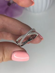 The ring is on Promotional Sale at 50% Off. Regular price for this ring is $33-$42 It is Beautiful Solid Sterling Silver 925 Criss Cross Ring With CZ Diamonds It will not rust or turn your finger green Will come in a box (one per package). Let us know if you have specific request please **We just opened our Store here on Etsy and very Exited to introduce you to our Sterling Silver 925 Jewelry:) (All Solid Sterling Silver 925! It is not plated, not Silver Alloy! Real Silver 925. We have Sterling Infinity Shaped White Gold Jewelry With Prong Setting, White Gold Infinity Jewelry With Prong Setting, Open Band Jewelry With Prong Setting For Promise, Dazzling Diamond Eternity Band For Promise Ring, Promise Jewelry With Prong Setting And Open Band, Gift Diamond Stackable Rings With Pave Setting, Dazzling Diamond Eternity Band As Promise Ring, Diamond Stackable Rings With Vvs Clarity And Open Band, Stackable Diamond Rings With Vvs Clarity