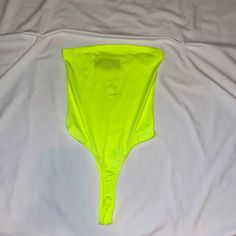 Brand New- Never Worn! With Tags Neon Bottoms For Summer Party, Green Stretch Summer Bodysuit, Neon Yellow Stretch Sleeveless Swimwear, Fitted Neon Summer Bottoms, Fitted Neon Bottoms For Summer, Neon Yellow Stretch Swimwear For Spring, Neon Stretch Bodysuit For Summer, Red Lace Bodysuit, Black Mesh Bodysuit