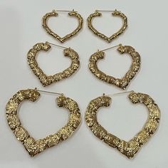 3 Pair Bundle Of Gold Heart Bamboo Earrings Hoop Earrings Gold Hoop Earrings Brand New In Packaging 90s Earrings Gold Bamboo Earrings Gold Hoops Hoop Earrings Heart Earrings Heart Hoops Heart Hoop Earrings Blogger Favorite 90s Style Bamboos Bamboo Heart Earrings, Heart Bamboo Earrings, Hooped Earrings, Gold Earrings Hoops, Gold Heart Earrings, Gold Bamboo Earrings, Chunky Gold Jewelry, Jewelry Closet, Bamboo Hoop Earrings