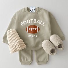 About This Item: Made to match this set is complete with a football top and matching pants (beanie slippers in image are not included). Product ID: BB46769 Material: 90% Cotton Color: Grey Green Size Chart Size(Age) Height(CM) Chest (CM) Waist (CM) 0-3M 52-59 54 36 3-6M 60-66 57 38 6-12M 67-75 60 40 12-18M 75-85 63 42 18-24M 85-95 66 44 2-3T 95-105 69 46 *Babies grow at their own pace. It's recommended to choose the size that corresponds to your mini's height and weight rather than their age ... Baby Football Outfit, Baby Picture Outfits, Baby Boy Football, Football Outfit, Football Top, Football Tops, Baby Boutique Clothing, Football Baby, Football Boys