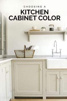 a kitchen with white cabinets and an open shelving above the sink is featured in this article