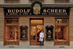 a man standing in front of a store