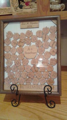 a wooden frame filled with lots of hearts