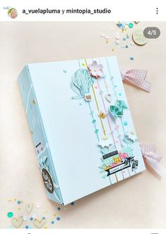 an open box with some decorations on it