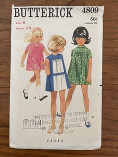 an old pattern for children's dress and top with short sleeves, from the 1950's