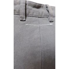 Introducing the Maison Martin Margiela High Cut Wide Leg Pant. This vintage grey pant is a high-cut style with wide legs. It features distinctive front seams that extend down from the two front pockets and a half snap/half button fly. This pant is perfect for any occasion. Whether you're looking for a casual look or something more formal, this pant is sure to make a statement. Its unique design and quality craftsmanship make it a must-have for any wardrobe. Experience the timeless style of Maison Martin Margiela with the High Cut Wide Leg Pant. Get yours today at Anastasia Boutique. Fitted Gray Pants With Hip Pockets, Fitted Gray Bottoms With Hip Pockets, Gray Tapered Leg Pants With Belt Loops, Gray Trousers With Welt Pockets, Tailored Gray Tapered Leg Bottoms, Fitted Gray Pants With Side Pockets, Classic Straight Leg Bottoms With Seam Detailing, Fitted Wide-leg Work Pants With Side Pockets, Tailored Gray Bottoms For Tailoring