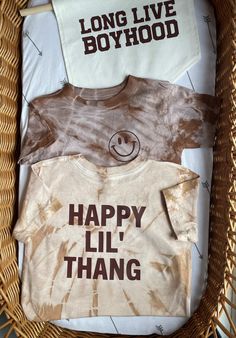 "Our best-selling \"Happy lil' thang\" tie dye t-shirt, ...but, this time, make it neutral 🤎 This retro t-shirt is currently available in tan & brown tie-dye. If you would prefer a different color variation or a personalized text on the back of the t-shirt, please reach out in messages! Please note there is also a smiley only choice in the \"style\" option when placing an order if you are looking for a retro smiley face tee :) Thank you for stopping by! I'm Ashlyn and everything in my shop is d Playful Tie Dye Short Sleeve T-shirt, Playful Tie-dye Short Sleeve T-shirt, Playful Tie Dye Cotton Tops, Playful Cotton Tie Dye Tops, Playful Cotton Tie-dye Tops, Crunchy Baby, Smiley Face Tee, Retro Smiley Face, Kid Styles