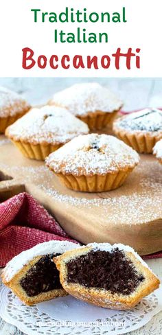 an italian dessert with powdered sugar on top and chocolate filling in the middle, sitting on a white plate