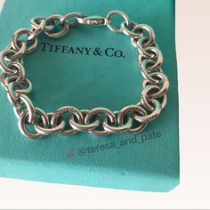 This Bracelet Is Marked Tiffany & Co. 1995 925 On Center Link. This Was Never Worn And Comes With Box And Dust Bag. This Is For The Charm Bracelet Only. Please Visit My Closet To View The Rest Of The Set Visit My Closet For Tiffany & Co. Charms All New) Size 7.5 Luxury Sterling Silver Oval Link Bracelet Gift, Classic Engraved Sterling Silver Bracelet, Luxury Sterling Silver Bracelet With Oval Link, Luxury Hallmarked Sterling Silver Bracelet, Luxury Sterling Silver Bracelet With Polished Finish For Anniversary, Luxury Sterling Silver Bracelet For Anniversary With Polished Finish, Classic Hallmarked Sterling Silver Bracelet, Designer Jewelry With Sterling Silver Clasp, Designer Hallmarked Bracelets For Formal Occasions