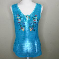 Wear This Over A Tank Or Cami In Warm Weather, And Then Over A Long-Sleeved Top When It Turns Cool! From Armpit To Armpit It Measures Approx. 19" And About 25" From Shoulder To Hem. Has Store Tag Only. Casual Blue Crochet Top For Spring, Blue Crochet Top For Beach In Spring, Light Blue Cotton Tops For Festivals, Bohemian Turquoise Tops For Summer, Blue Cotton Crochet Top For Summer, Light Blue Floral Embroidery Tops For Vacation, Blue Bohemian Crochet Top For Beach Season, Blue Bohemian Tops For Beach Season, Bohemian Blue Tops For Beach Season