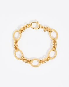 Knotted gold chain sits between textured oval links creating a versatile bracelet with modern elegance.Materials18ct gold plated silverBracelet length (approx)17.5cm 2cm extender Modern Gold Plated Oval Link Bracelet, Modern Gold-plated Oval Link Bracelet, Gold Charm Bracelet With Oval Link Cable Chain, Modern Oval Gold Chain Bracelets, Gold Oval Link Cable Chain Bracelet, Elegant Gold Chain Bracelet With Hooks And Links, Gold-tone Oval Link Bracelet, Gold Oval Metal Chain Bracelet, Oval Gold Metal Chain Bracelet