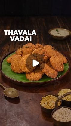 there is a plate with fried food on it and the words thaavala vadai