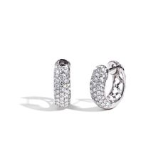 A stylish pair of huggie earrings showcasing 1.14ctw pav diamonds going down the front half of the hoop, designed with small hearts on the back. Beautifully crafted in 18K white gold. White Diamond Huggie Earrings With Pave Setting, White Gold Cubic Zirconia Huggie Earrings With Pave Setting, Dazzling Huggie Earrings With Pave Setting, Luxury Diamond White Brilliant Cut Huggie Earrings, Luxury Diamond White Diamond Huggie Earrings, Luxury Pave Setting White Gold Huggie Earrings, Luxury Brilliant Cut Diamond Huggie Earrings, Luxury Diamond Huggie Earrings In Diamond White, Diamond White Platinum Hoop Earrings With Pave Setting