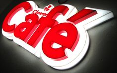 a close up of a neon sign with the word sale spelled out in large letters