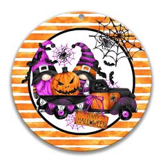 an orange and white striped circle with halloween decorations