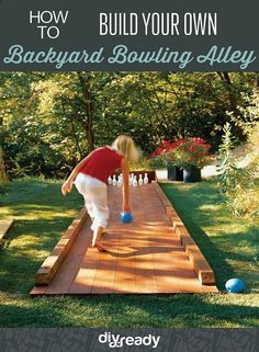 an image of a person playing with balls on a wooden walkway in the grass and trees