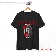 Rock Out in Style with Twenty One Pilots T-Shirts! |-/ Attention all Twenty One Pilots fans! Elevate your wardrobe with our exclusive T-shirts featuring unique designs inspired from Clancy. Perfect for any occasion, from concerts to casual hangouts, these tees will keep you comfortable and stylish while showing off your love for TOP. Available in sizes S - 5XL and a variety of colors to match your vibe. 𓃮 About the Product: - Made with Gildan Heavy Cotton 5000, ensuring a durable and comfortabl Edgy Fan Merchandise T-shirt With Logo Print, Edgy T-shirt For Fan Merchandise With Logo Print, Edgy T-shirt With Logo Print For Fan Merchandise, Edgy Fan Merchandise T-shirt With Text Print, Edgy Short Sleeve T-shirt With Front Print, Edgy Shirt With Front Print And Short Sleeves, Edgy Fan Merchandise T-shirt With Short Sleeves, Edgy T-shirt With Front Print And Crew Neck, Pilot T Shirt