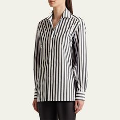 Ralph Lauren Collection "Capri" shirt in vertical stripes Spread collar; button front Long sleeves; button cuffs Relaxed fit Back yoke Cotton Made in Italy Size Note:   Height: 5'10"/ waist 24”/ hips 36"/ bust 34" Model is wearing size 6 Classic Tops With Signature Stripes For Work, Classic Workwear Tops With Signature Stripes, Elegant Shirt With Vertical Stripes For Daywear, Workwear Shirt With Vertical Stripes And Spread Collar, Button-up Shirt With Signature Stripes For Work, Pinstripe Shirt With Placket For Work, Workwear Button-up Shirt With Signature Stripes, Collared Shirt With Vertical Stripes For Work, Chic Vertical Stripes Shirt For Daywear