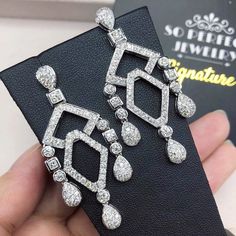 HANDCRAFTED TO PERFECTION! SPECIALLY DESIGNED! ABSOLUTELY Art Deco, GEOMETRIC, CHANDELIER EARRINGS. WITH OVER 178 PIECES OF PREMIUM GRADE, UNTREATED AND GENUINE F/VS QUALITY SPARKLING DIAMONDS! Perfect for every event! SET IN 18K SOLID WHITE GOLD HANDCRAFTED, CHANDELIER EARRINGS! THESE EARRINGS ARE SO BIG AND DAZZLING! EVERYBODY WON'T BE ABLE TO STOP LOOKING AT THEM! RETAIL VALUE: $8,600 DIAMONDS: 178 ROUND BRILLIANT, FULL CUT with excellent firing diamonds, weighting at 4.10 carats. ALL NATURAL Luxury Teardrop Bridal Earrings For Formal Occasions, Exquisite Diamond Chandelier Earrings With Accents, Luxury Hand Set Drop Bridal Earrings, Luxury Cubic Zirconia Bridal Earrings With Elegant Design, Luxury Hand-set Drop Bridal Earrings, Luxury Bridal Drop Earrings Hand Set, Luxury Teardrop Bridal Earrings In Cubic Zirconia, Luxury Bridal Drop Earrings With Diamond Accents, Luxury Teardrop Bridal Earrings With Cubic Zirconia