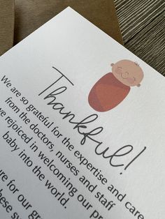 a thank card with an image of a baby on it