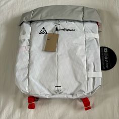 This Nike Acg Backpack Is A Versatile And Durable Option For Any Hiking Or Camping Trip. With A 32l Capacity, It Has Plenty Of Space For All Your Necessary Gear. The Backpack Features Magnetic Closure, Padded Straps, And An Adjustable Size For Comfortable Wear. The Shoulder Bag Is Made Of Polyester And Canvas Materials, With A Nylon Frame. It Includes External And Elastic Pockets, As Well As Insulated And Water-Resistant Features. The Backpack Is Lightweight And Collapsible, Making It Easy To St Waterproof White Bag For Daily Use, White Waterproof Bag For Daily Use, White Waterproof Backpack For Outdoor Activities, White Waterproof Bags For Daily Use, White Waterproof Backpack For Outdoor, White Nylon Hiking Bag, Functional White Hiking Bag, White Waterproof Everyday Bags, White Nylon Backpack For Hiking