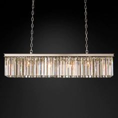 a rectangular chandelier hanging from a chain